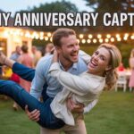 Man lifting his wife in a funny fail pose (about to fall), both laughing, candid vibe, backyard party setup — “Funny Anniversary Captions” in bold handwritten font floating above them